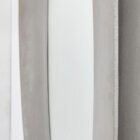 Specchio ovale con cornice in alluminio pressofuso di Lorenzo Burchiellaro