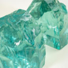 Coppia di fermalibri in cristallo mod. 1977 di Max Ingrand per Fontana Arte
