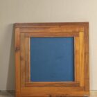 Specchio con cornice in legno di Ettore Sottsass per Poltrona