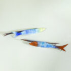 Coppia di Pesci in rame di Gio Ponti per De Poli Coppia di Pesci in rame di Gio Ponti per De Poli